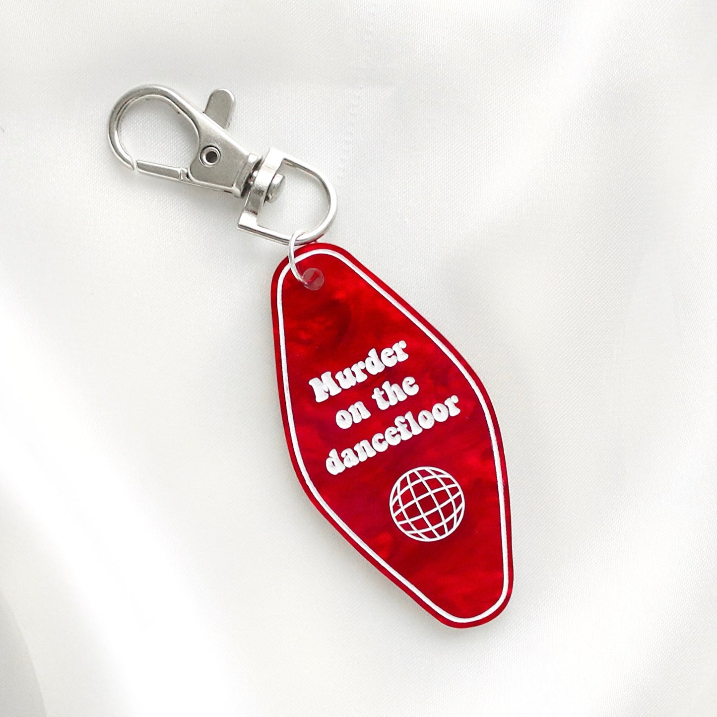 Murder on the dance floor keyring